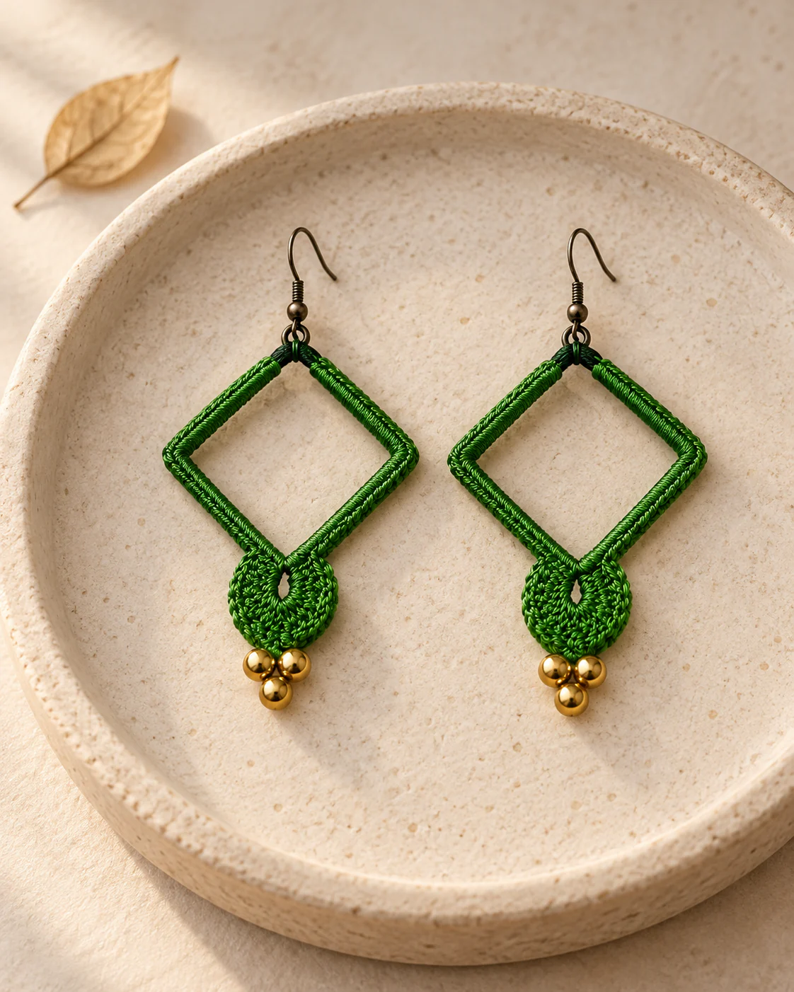 Emerald crochet earrings in its natural setting