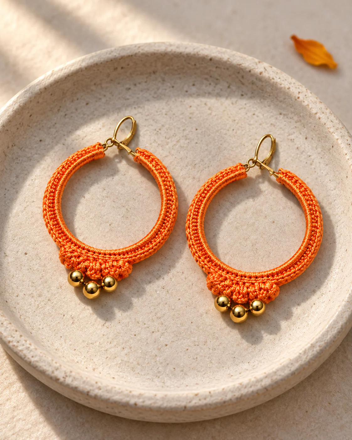 Orange crochet hoop earrings